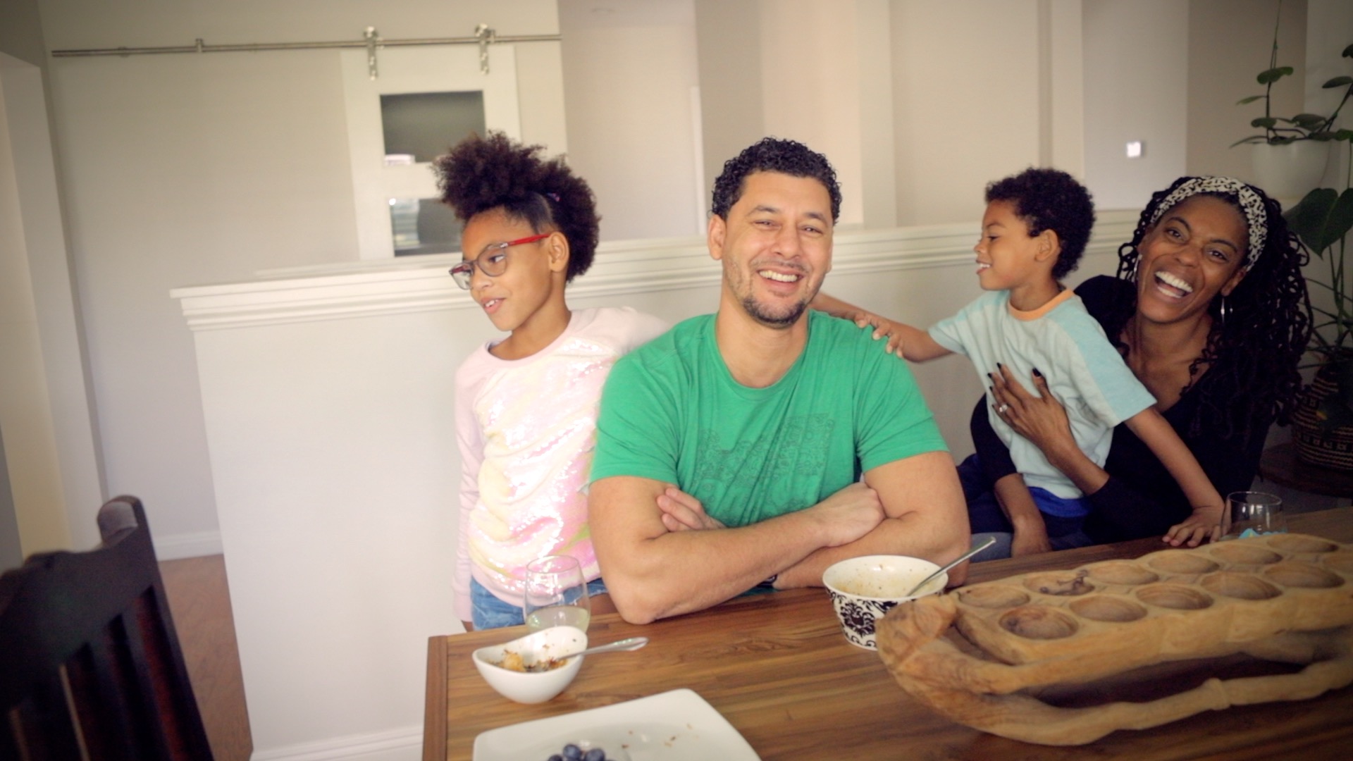 a family laughing and smiling