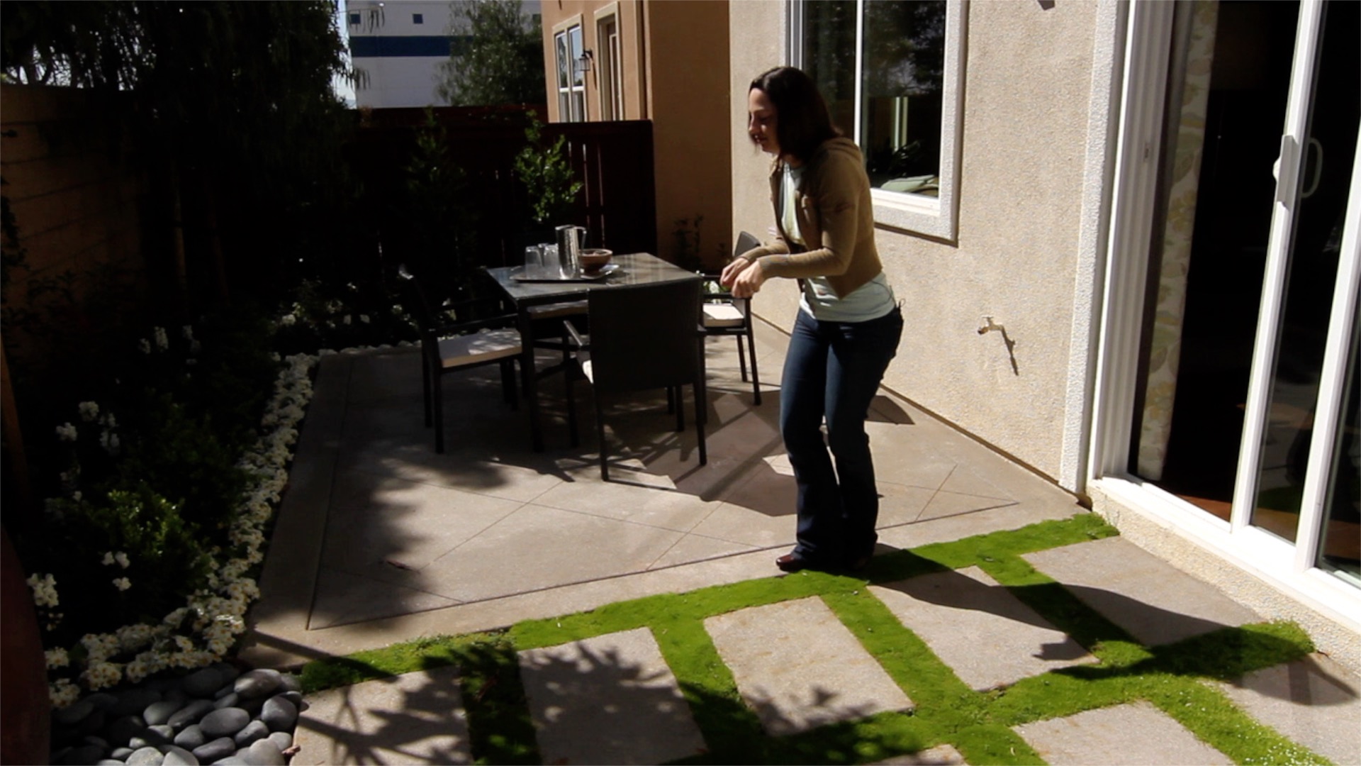 a woman in a backyard